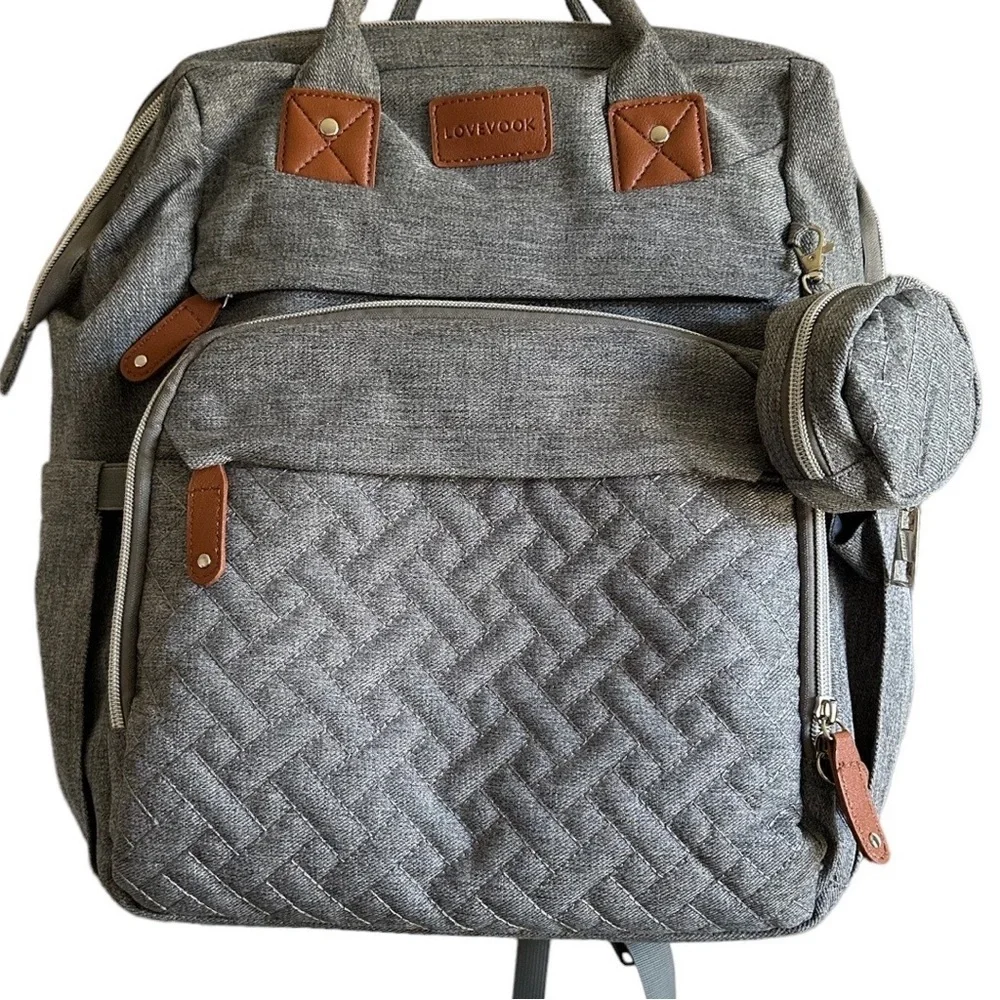 Boutique Large Diaper Bag, Backpack, Bassinet, Tech Charging Station all in one